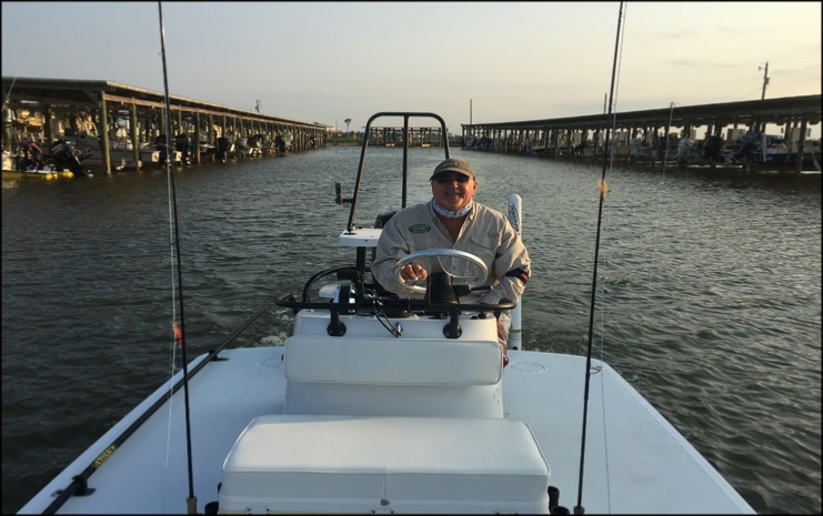 Captain Joe Mendez on fly fishing boat